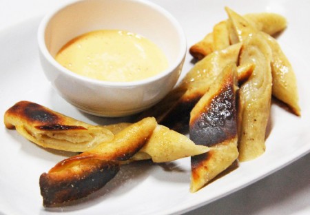 Grandmama´s stiskanec - baked salty  potato lokscha with garlic oil served with Yes!Pub sauce 90 B